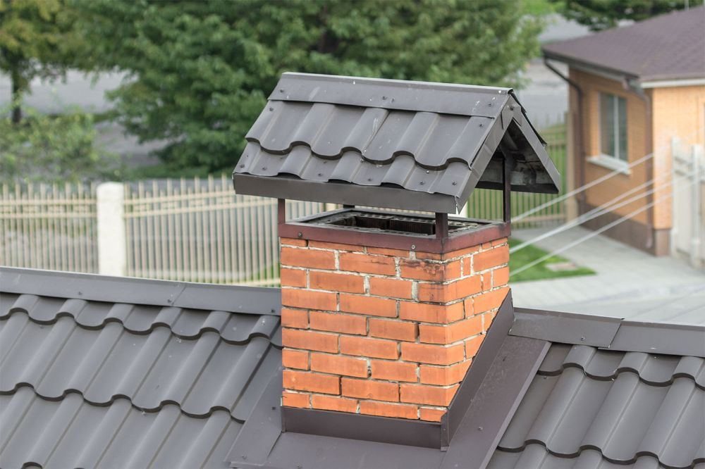 Brick chimney with mortar joints showing wear