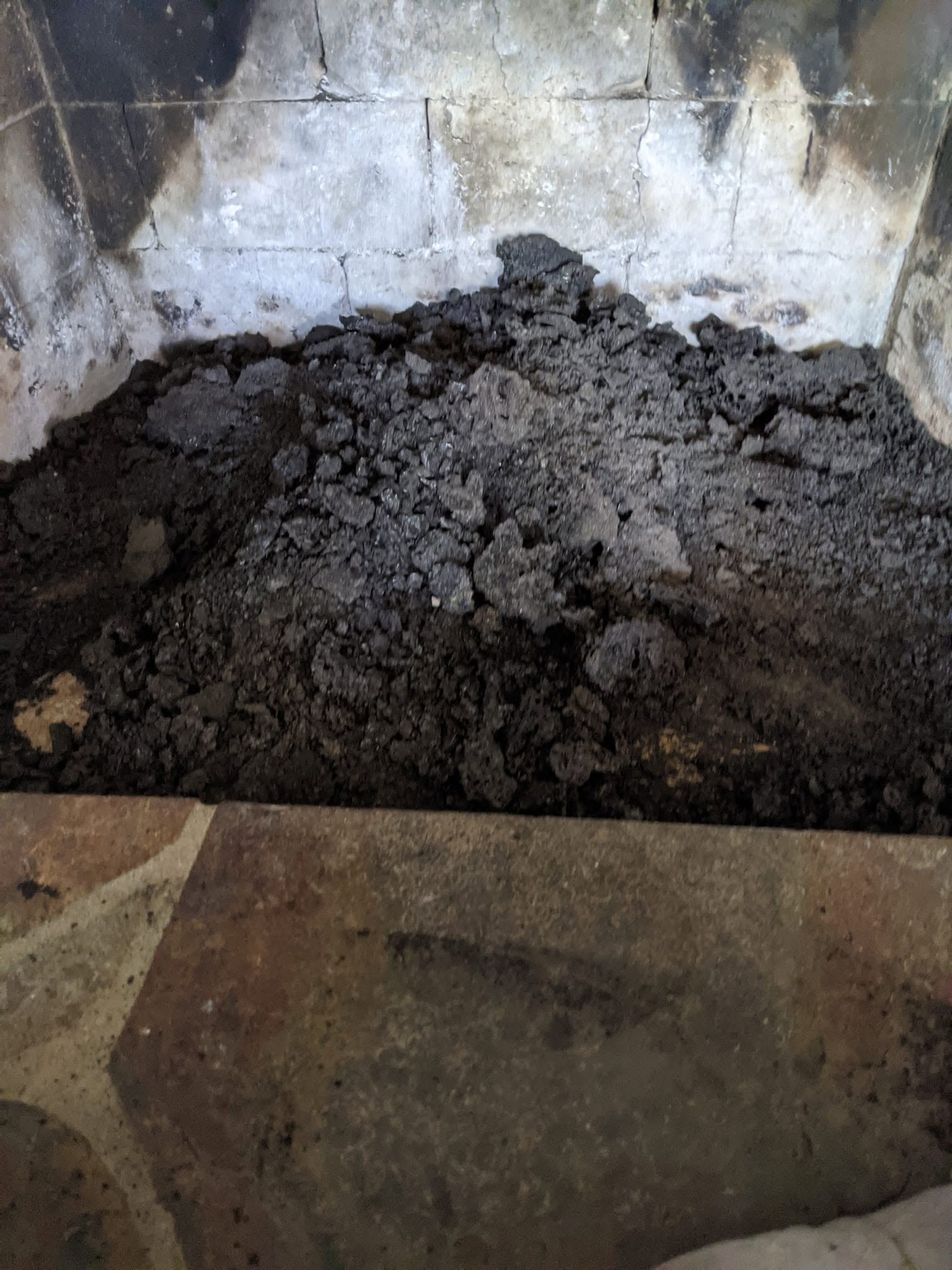 Soot and creosote cleared from a firebox